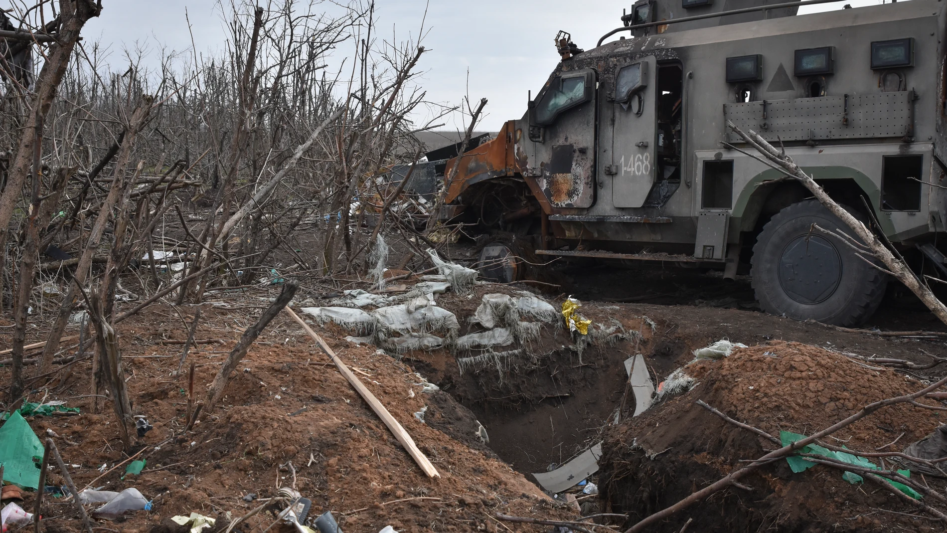 A burnt APC is seen after heavy fight on the front line in the village of Robotyne, Zaporizhzhia region, Ukraine, Friday, March 1, 2024. (AP Photo/Andriy Andriyenko)