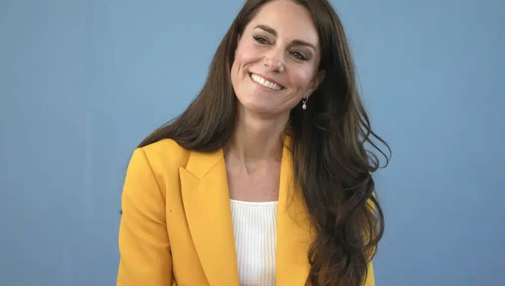 Britain's Kate, Princess of Wales, is all smiles as she visits the Dame Kelly Holmes Trust and meets with some of the young people that the charity supports in Bath, England, Tuesday, May 16, 2023. The Princess of Wales has been hospitalized for planned abdominal surgery and will remain at The London Clinic for up to two weeks, Kensington Palace said Wednesday, Jan. 17, 2024. (AP