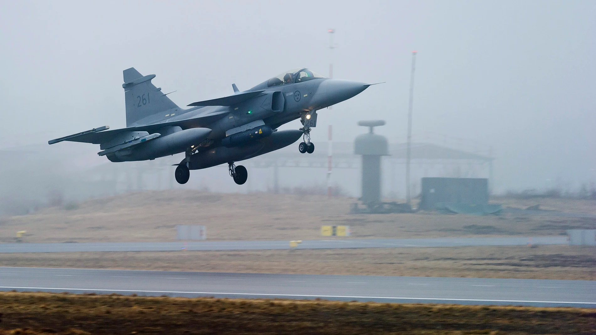 FILE - One of three Swedish Air Force JAS 39 Gripen fighter aircraft takes off from the Blekinge Wing F17, based in Kallinge southern Sweden for a base in Sardinia to join the Nato-led operation in Libya, on Saturday, April 2, 2011. As Sweden joins NATO, it bids a final farewell to more than two centuries of neutrality. (AP Photo/Scanpix/Patric Soderstrom, File)