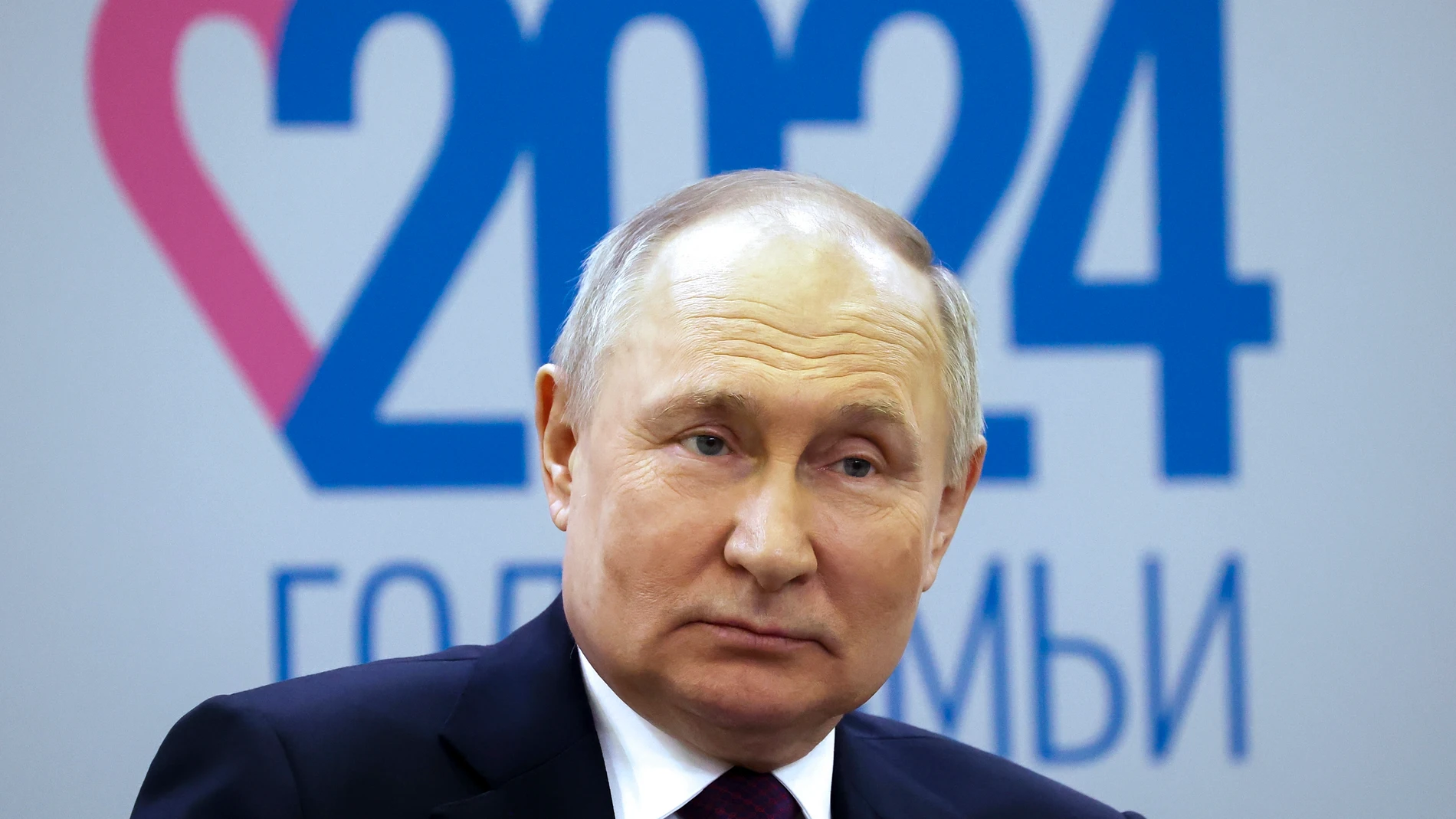 FILE - Russian President Vladimir Putin attends a forum at the VDNKh exhibition of economic achievements in Moscow, Russia, Tuesday, Jan. 23, 2024. Over the last decade, Putin's Russia evolved from a country that tolerates at least some dissent to one that ruthlessly suppresses it. Arrests, trials and long prison terms — once rare — are commonplace. (Sergei Karpukhin, Sputnik, Kremlin Pool Photo via AP, File)