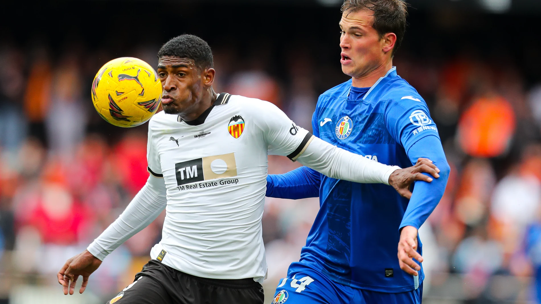 Cristhian Mosquera of Valencia and Juanmi Latasa of Getafe CF in action during the Spanish league, La Liga EA Sports, football match played between Valencia CF and Getafe CF at Mestalla stadium on March 9, 2024, in Valencia, Spain. AFP7 09/03/2024 ONLY FOR USE IN SPAIN