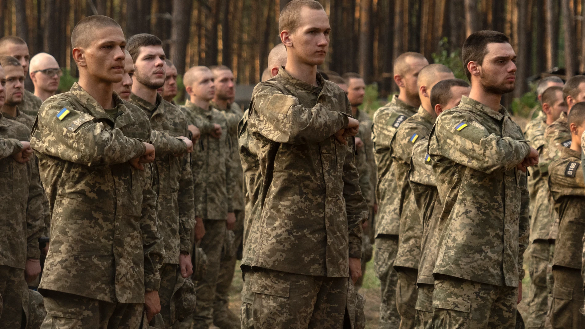 Newly recruited soldiers of Ukraine's 3rd Assault Brigade line up at a military base close to Kyiv, Ukraine, Monday, Sept. 25, 2023. The loss of the city of Avdiivka in February, 2024 marked the end of a long, exhausting defense for the Ukrainian military. One brigade had defended the same block of buildings for months without a break. (AP Photo/Efrem Lukatsky)