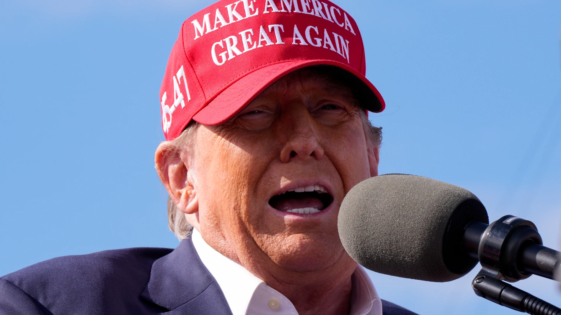 FILE - Republican presidential candidate former President Donald Trump speaks at a campaign rally March 16, 2024, in Vandalia, Ohio. Trump's new joint fundraising agreement with the Republican National Committee directs donations to his campaign and a political action committee that pays the former president's legal bills before the party gets a cut, according to a fundraising invitation obtained by The Associated Press. (AP Photo/Jeff Dean, File)