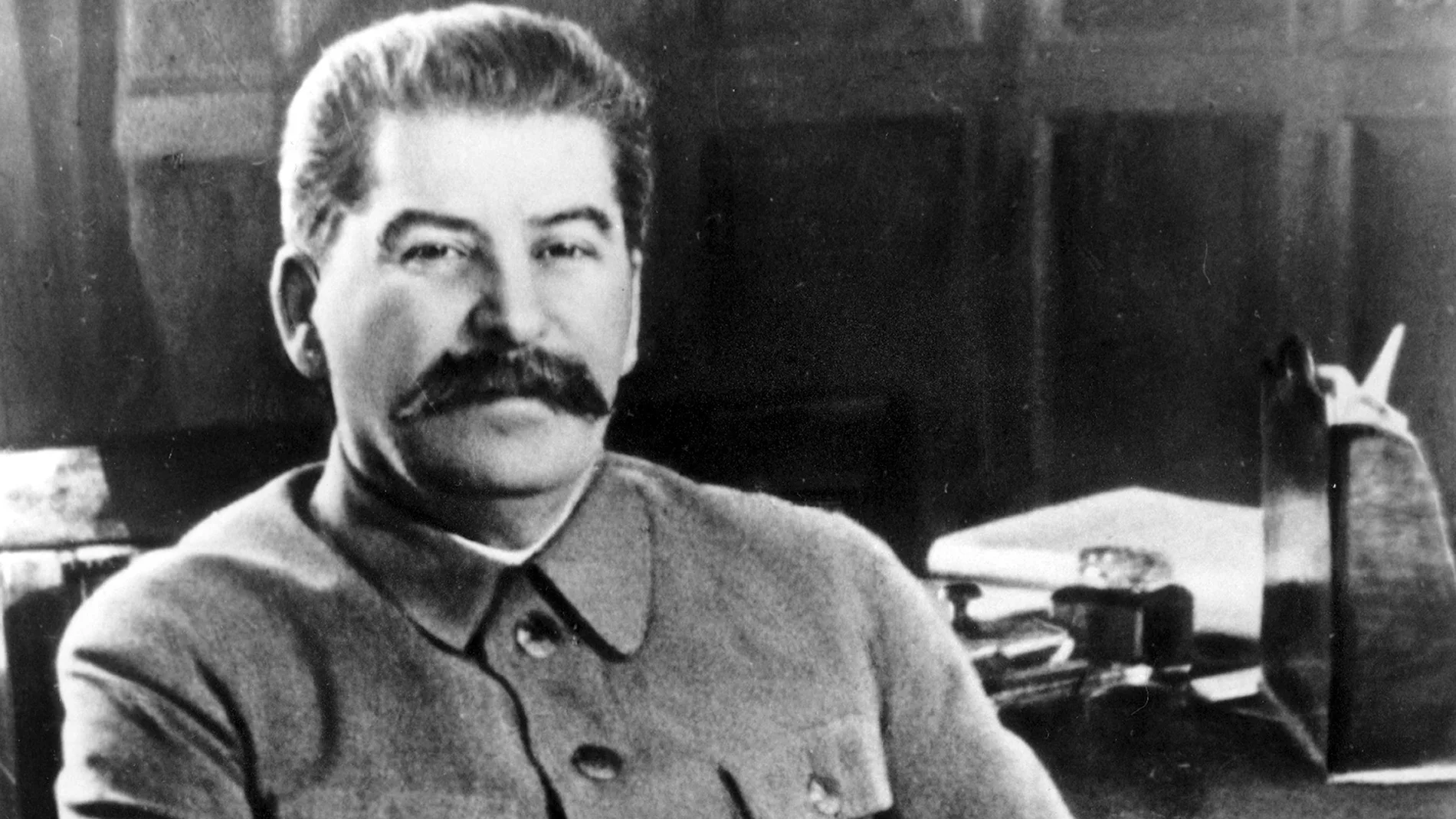 Josef Stalin, secretary-general of the Communist Party of the Soviet Union and premier of the Soviet state, poses at his desk in the Kremlin, Moscow, Russia in Feb. 1950