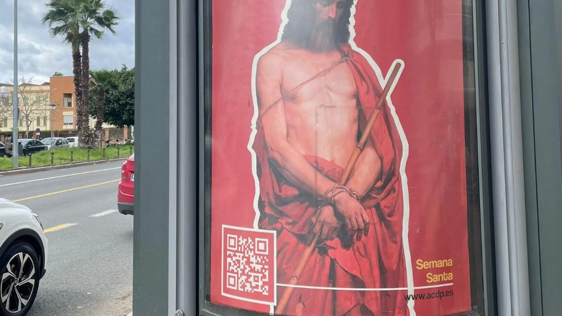 Cartel altermativo de la ACdP en una marquesina de Sevilla