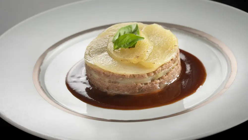 Patatas confitadas con butifarra de perol