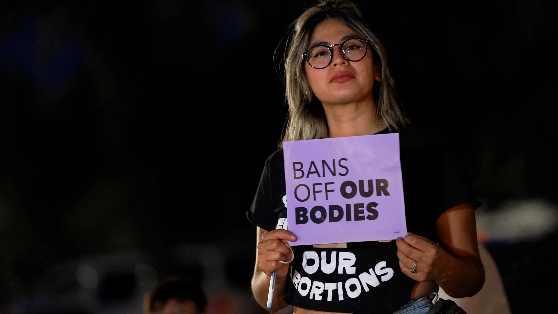 FILE - This file photo shows Celina Washburn at a protest on Sept. 23, 2022, outside the Arizona Capitol in Phoenix to voice her opposition to an abortion ruling. he Arizona Supreme Court ruled Tuesday., April 9, 2024, that the state can enforce its long-dormant law criminalizing all abortions except when a mother’s life is at stake. (AP Photo/Matt York, File)