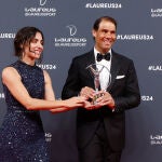 Xisca Perelló junto a Rafa Nadal.