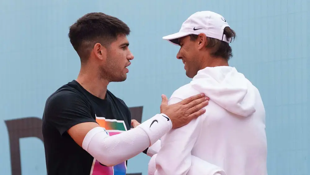 Alcaraz y Nadal, en un entrenamiento en la Caja Mágica