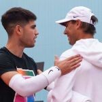 Alcaraz y Nadal, en un entrenamiento en la Caja Mágica