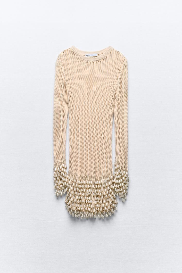 Vestido abalorios.