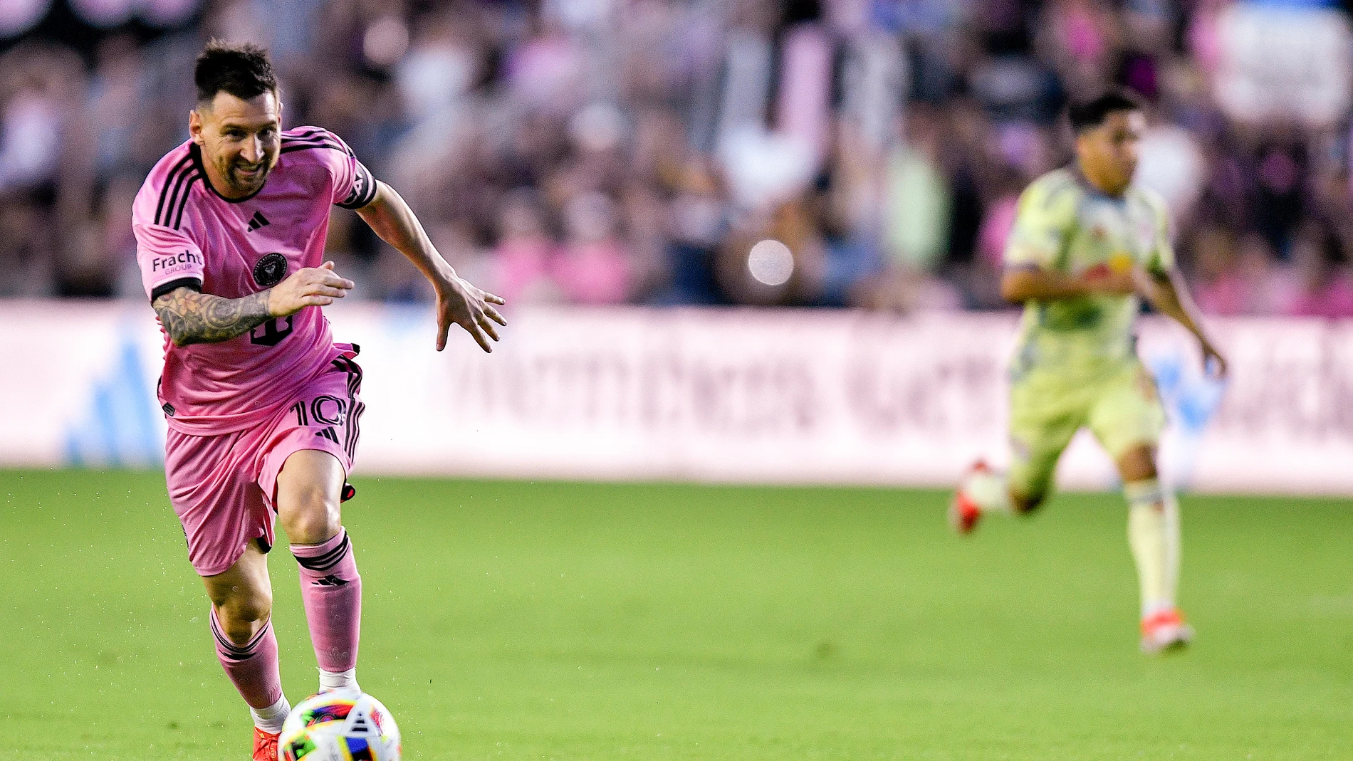 Inter Miami forward Lionel Messi dribbles the ball during the first half of an MLS soccer game against the New York Red Bulls, Saturday, May 4, 2024, in Fort Lauderdale, Fla. (AP Photo/Michael Laughlin)