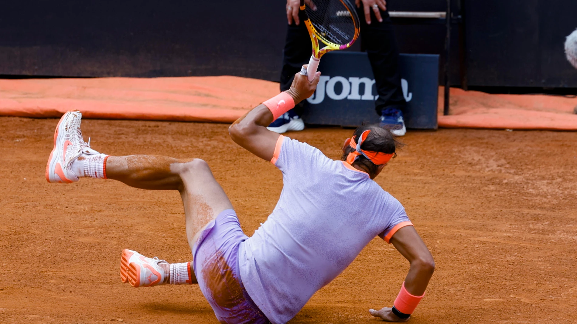 Rome (Italy), 09/05/2024.- Rafael Nadal of Spain gets up after falling to score a point against Zizou Bergs of Belgium in their men's singles first round match at the Italian Open tennis tournament in Rome, Italy, 09 May 2024. (Tenis, Bélgica, Italia, España, Roma) EFE/EPA/FABIO FRUSTACI