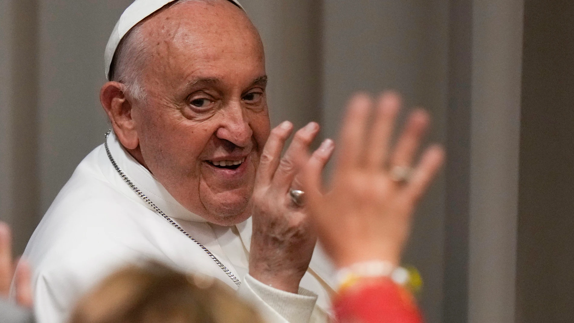 Pope Francis leaves at the end of a session with children of the World Meeting For Human Fraternity in the New Synod Hall at the Vatican, Saturday, May 11, 2024. (AP Photo/Alessandra Tarantino)