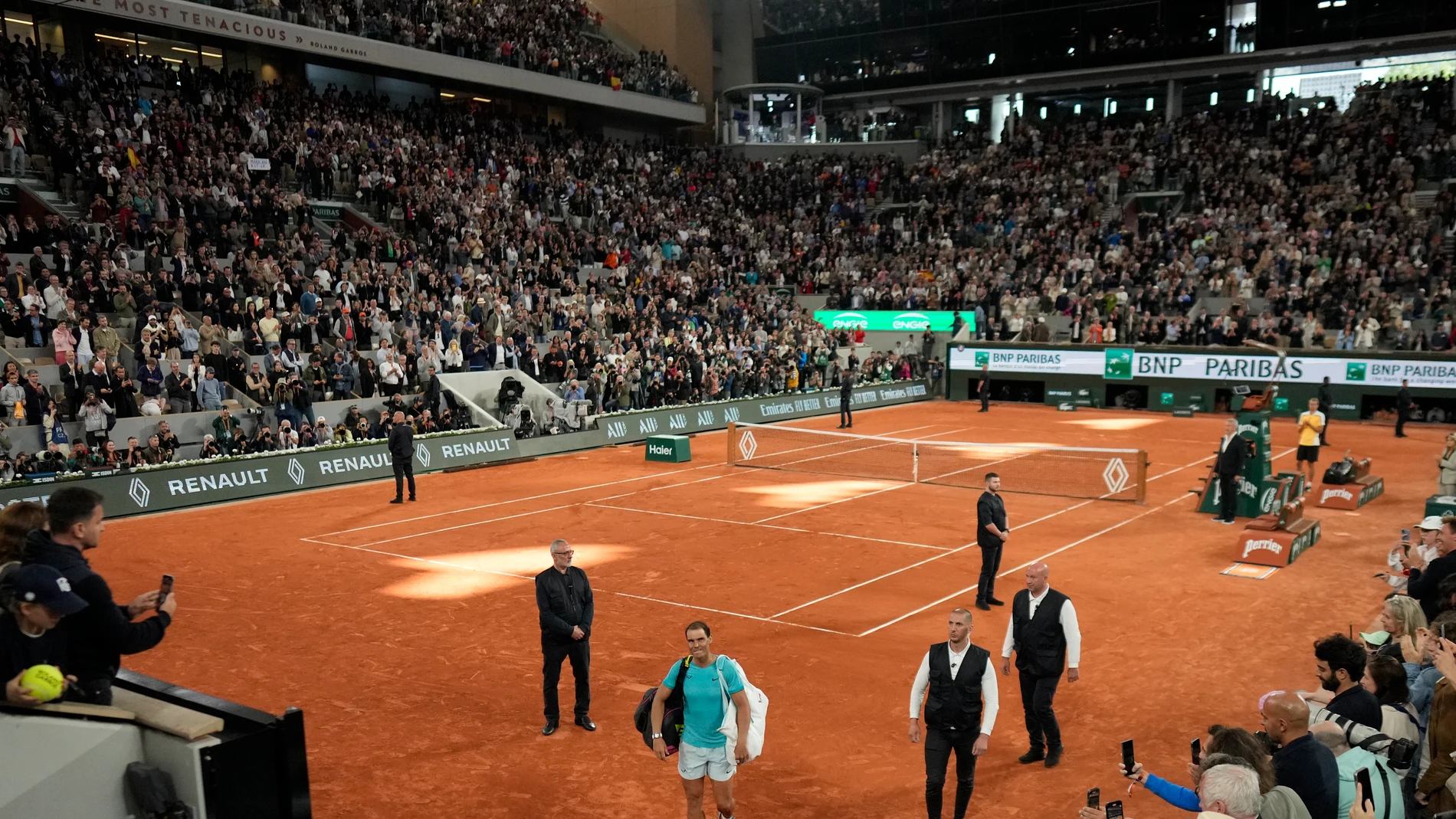 Spain's Rafael Nadal, center, leaves the court after losing against Germany's Alexander Zverev during their first round match of the French Open tennis tournament at the Roland Garros stadium in Paris, Monday, May 27, 2024. (AP Photo/Thibault Camus)