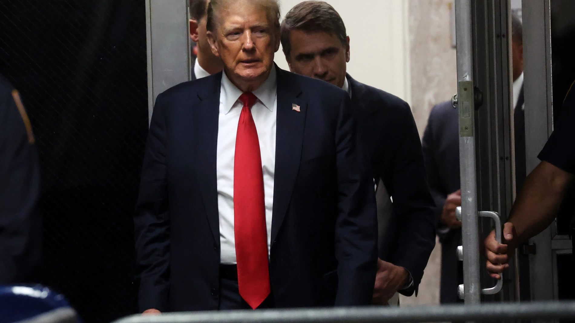 Former President Donald Trump walks back into the courtroom after a break during closing arguments in his criminal hush money trial at Manhattan criminal court in New York, Tuesday, May 28, 2024. (Spencer Platt/Pool Photo via AP)