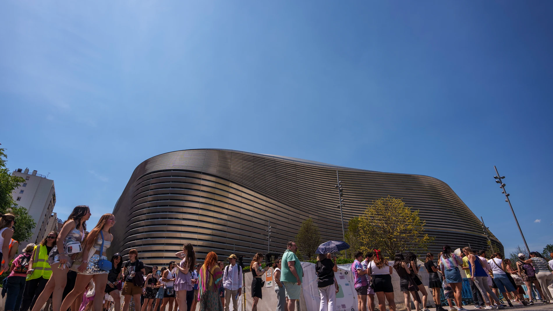 Fans of US singer Taylor Swift queue to enter her concert, outside Santiago Bernabeu stadium in Madrid, Spain, Wednesday, May 29, 2024. (AP Photo/Manu Fernandez)