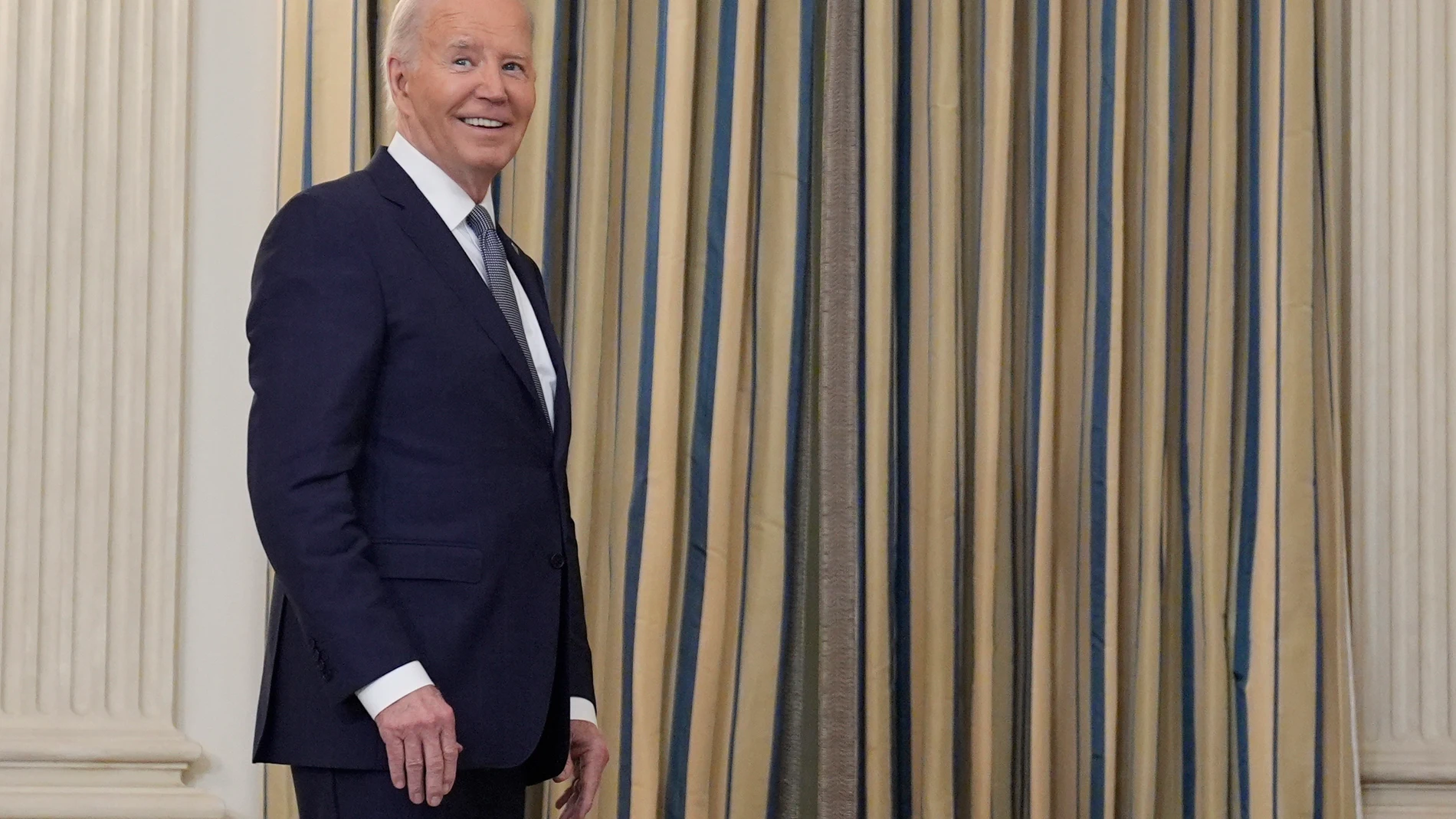 President Joe Biden pauses while leaving after delivering remarks on the verdict in former President Donald Trump's hush money trial and on the Middle East, from the State Dining Room of the White House, Friday, May 31, 2024, in Washington. (AP Photo/Evan Vucci)