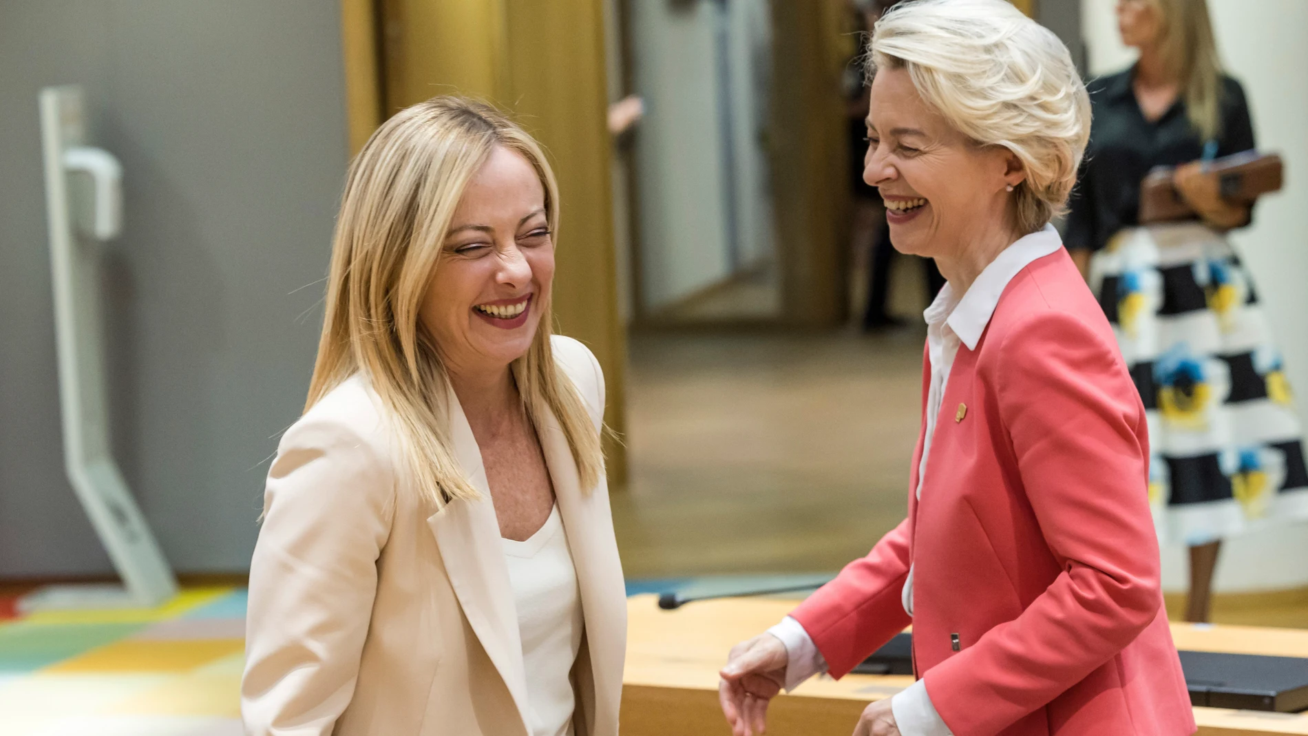 FILE - Italy's Premier Giorgia Meloni, left, greets European Commission President Ursula von der Leyen during a round table meeting at an EU summit in Brussels, Thursday, June 29, 2023. Meloni's popularity is expected to ensure significant gains for her far-right Brothers of Italy Party in June's European Parliamentary elections, and European Commission President Ursula Von der Leyen, who has exhibited a liking for Meloni, has already floated the notion of bringing her into a coalition if nee...