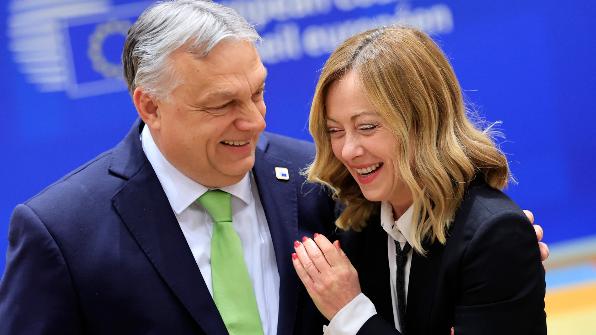 FILE - Hungary's Prime Minister Viktor Orban, left, speaks with Italy's Premier Giorgia Meloni during a round table meeting at an EU Summit in Brussels, Thursday, March 21, 2024. Meloni's popularity is expected to ensure significant gains for her far-right Brothers of Italy Party in June's European Parliamentary elections, and European Commission President Ursula Von der Leyen, who has exhibited a liking for Meloni, has already floated the notion of bringing her into a coalition if needed. (A...