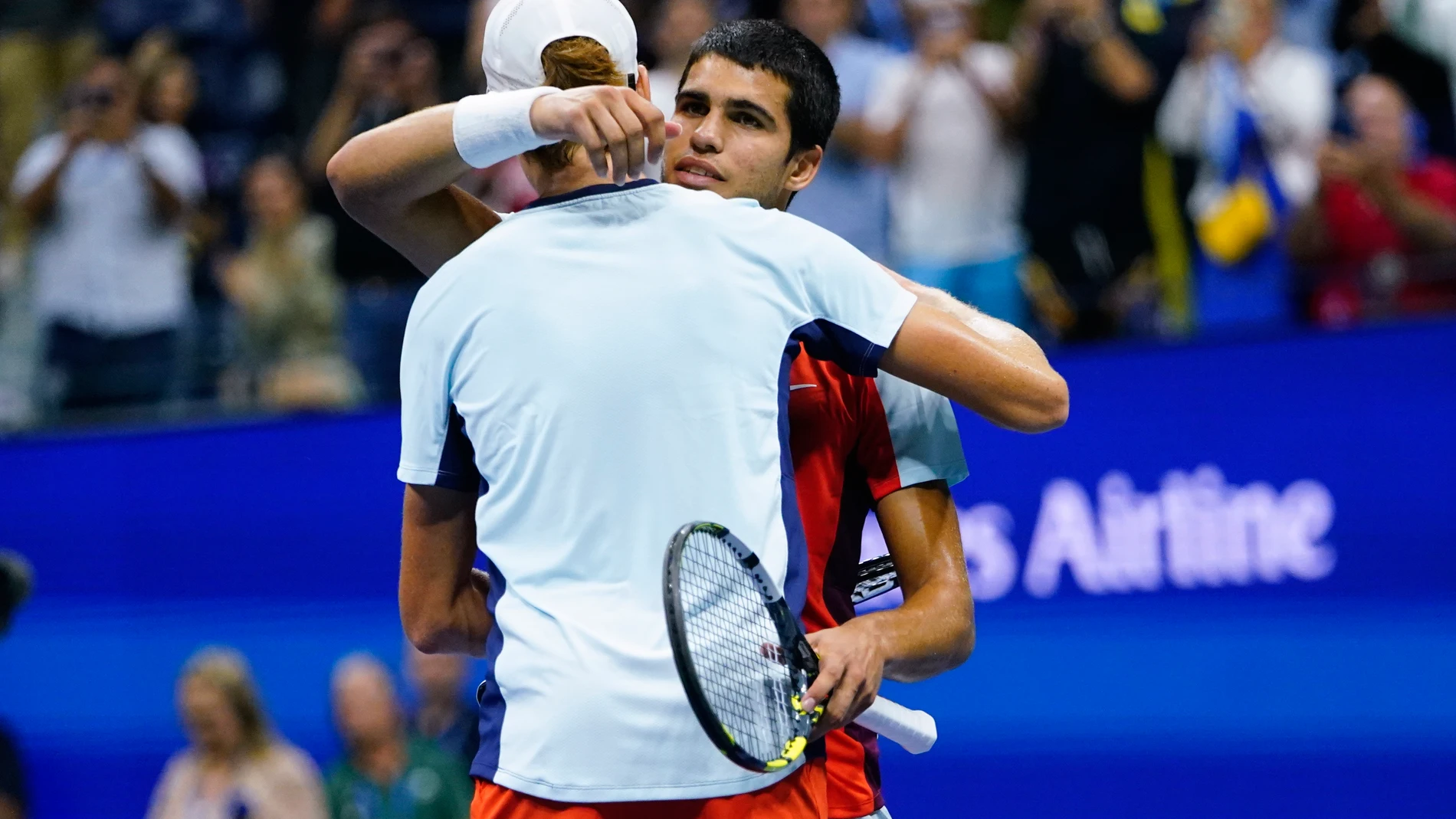 Carlos Alcaraz, of Spain, right, hugs Jannik Sinner, of Italy, after Alcaraz won their match in the quarterfinals of the U.S. Open tennis championships, early Thursday, Sept. 8, 2022, in New York. Alcaraz and Sinner will renew their rivalry on Friday June 7, 2024, in the French Open semifinals. (AP Photo/Frank Franklin II, File)