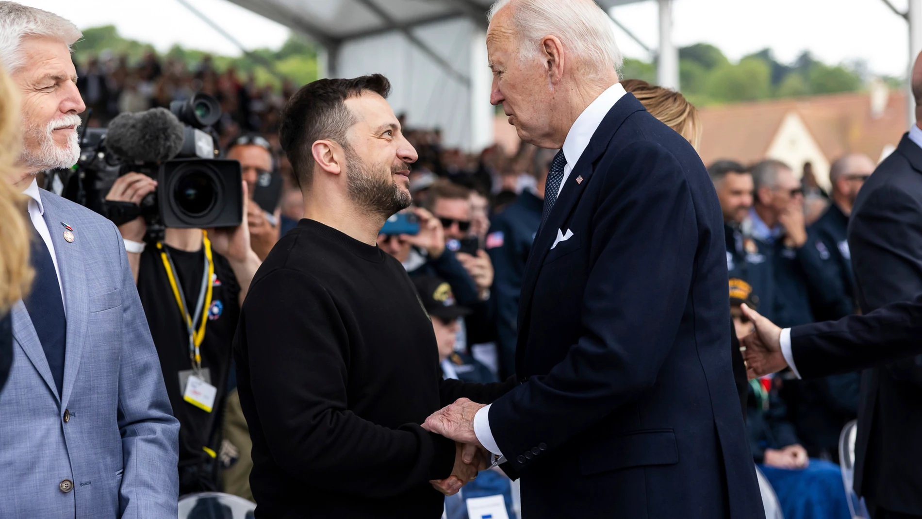 June 6, 2024, Saint-Laurent-Sur-Mer, Normandy, France: Ukrainian President Volodymyr Zelenskyy, left, greets U.S President Joe Biden, right, during the 80th anniversary commemoration at the Omaha Beach Memorial, June 6, 2024, in Saint-Laurent-sur-Mer, Normandy, France. 06/06/2024