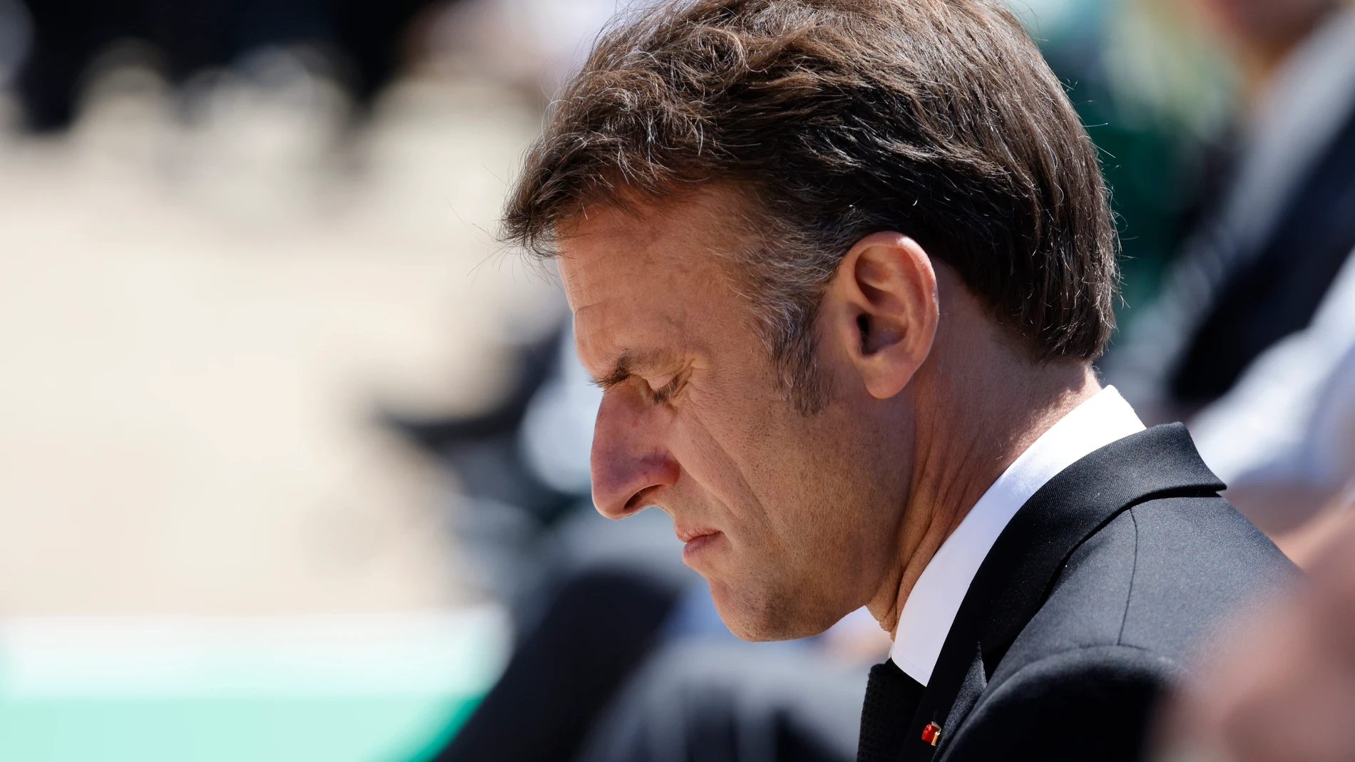 French President Emmanuel Macron attends a WWII in Oradour-sur-Glane, southwestern France, Monday, June 10, 2024. French President Emmanuel Macron called snap legislative elections, saying he could not ignore the new political reality after his pro-European party was handed a chastening defeat and projected to garner less than half the support of Marine Le Pen's National Rally. (Ludovic Marin via AP)