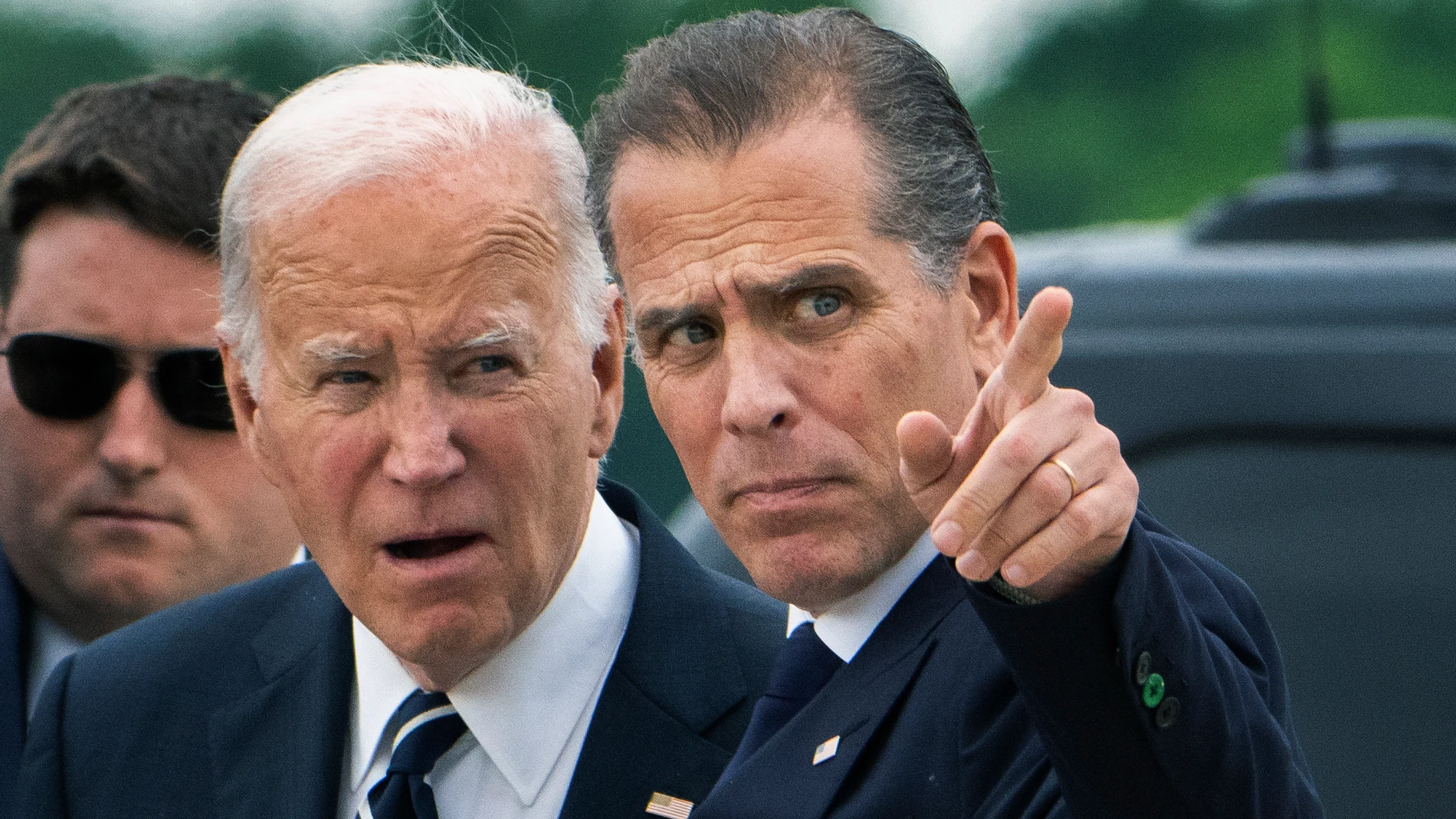 President Joe Biden talks with his son Hunter Biden as he arrives Delaware Air National Guard Base in New Castle, Del., Tuesday, June 11, 2024. (AP Photo/Manuel Balce Ceneta)