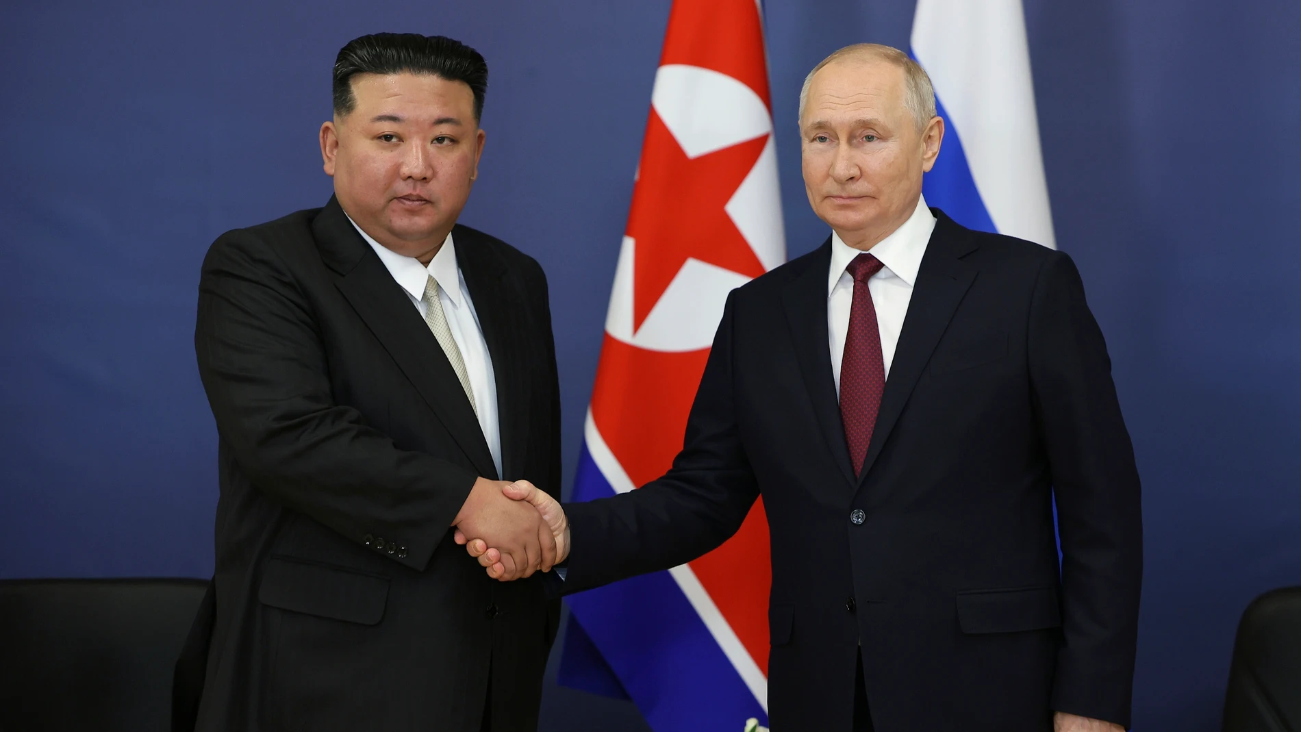 FILE - Russian President Vladimir Putin, right, and North Korean leader Kim Jong Un shake hands during their meeting at the Vostochny cosmodrome outside the city of Tsiolkovsky, about 200 kilometers (125 miles) from the city of Blagoveshchensk in the far eastern Amur region, Russia on Sept. 13, 2023. North Korean leader Kim hailed the country's relationship with Russia on Wednesday, June 12, 2024, as reports suggest that Russian President Putin will soon visit the isolated country for his thi...