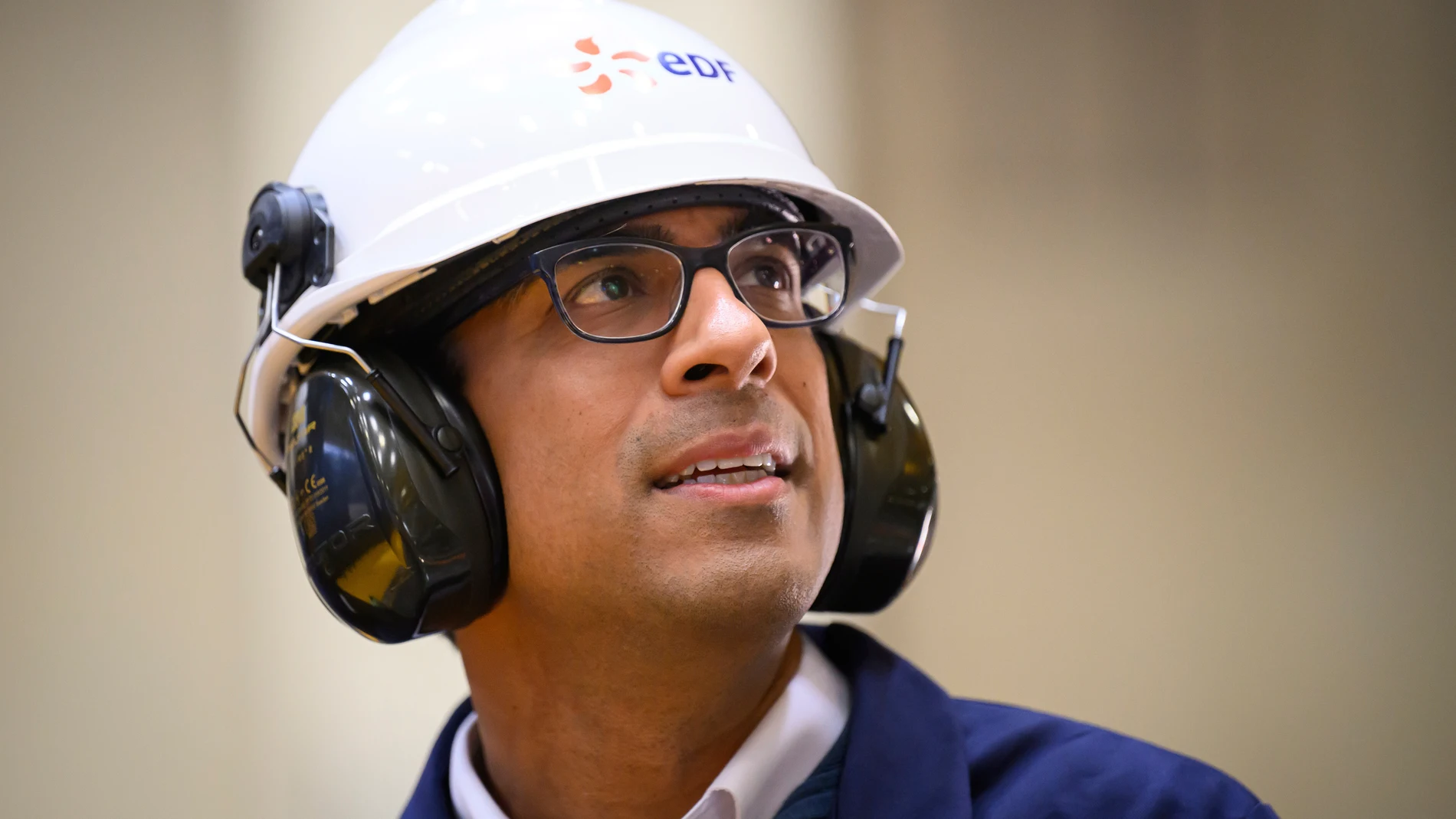 Britain's Prime Minister Rishi Sunak is given a tour of the Sizewell B nuclear power facility by Station Director Robert Gunn in Sizewell, England, Wednesday, June 19, 2024. (Leon Neal/Pool Photo via AP)