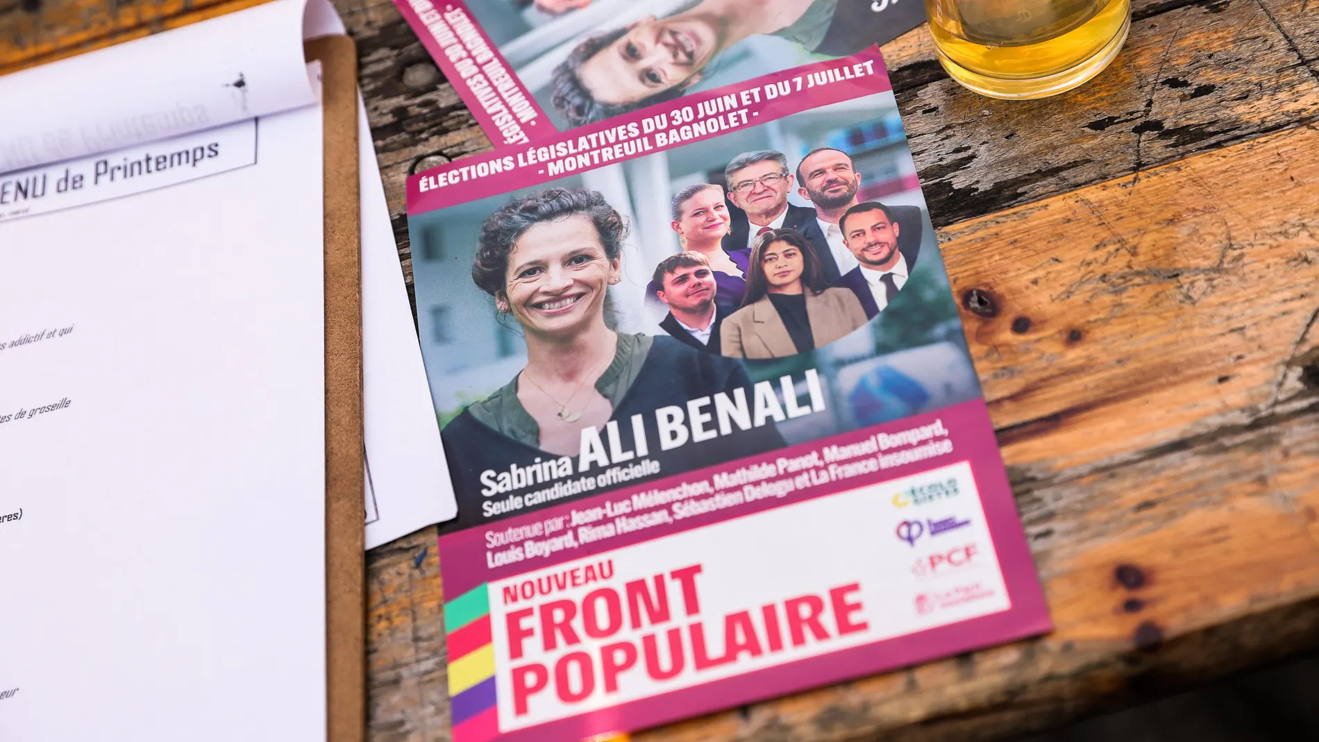 Montreuil (France), 21/06/2024.- A flier for the official candidate of the New Front populaire (NFP) in Montreuil/Bagnolet district Sabrina Ali Benali lays on a table during a festive campaign event organized by the New Front Populaire coalition in Montreuil, France, 21 June 2024. The New Front Populaire is an alliance of French left-wing parties for upcoming legislative elections in France on 30 June and 07 July. (Elecciones, Francia) EFE/EPA/TERESA SUAREZ