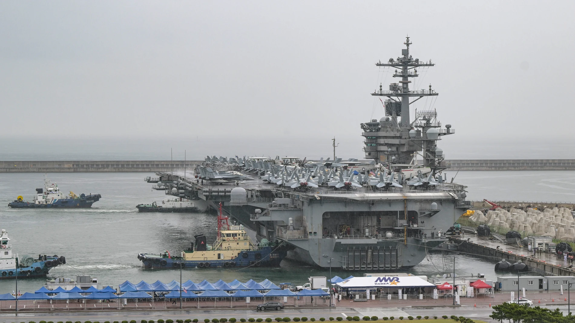 June 22, 2024, Seoul, SOUTH KOREA: June 22, 2024-Seoul, South Korea-The nuclear-powered aircraft carrier USS Theodore Roosevelt arrives at a naval base in the southeastern port city of Busan on June 22, 2024, in this photo provided by the Navy. The USS Theodore Roosevelt (CVN-71) arrived at a naval port in the southeastern city of Busan on Saturday, the Navy said, in a show of force against evolving North Korean threats emboldened by the North's deepening military cooperation with Russia. 22...