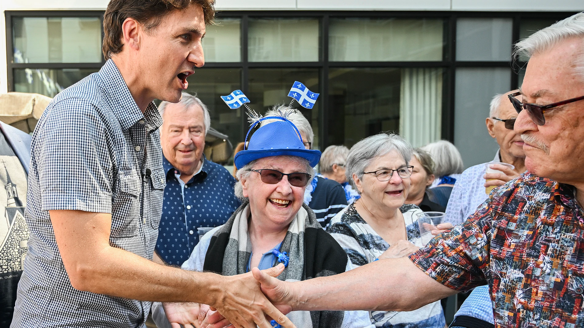 Canada Prime Minister Justin Trudeau greets people during a Fête Nationale event at a seniors residence in Trois-Rivieres, Quebec, Monday, June 24, 2024. (Graham Hughes/The Canadian Press via AP)