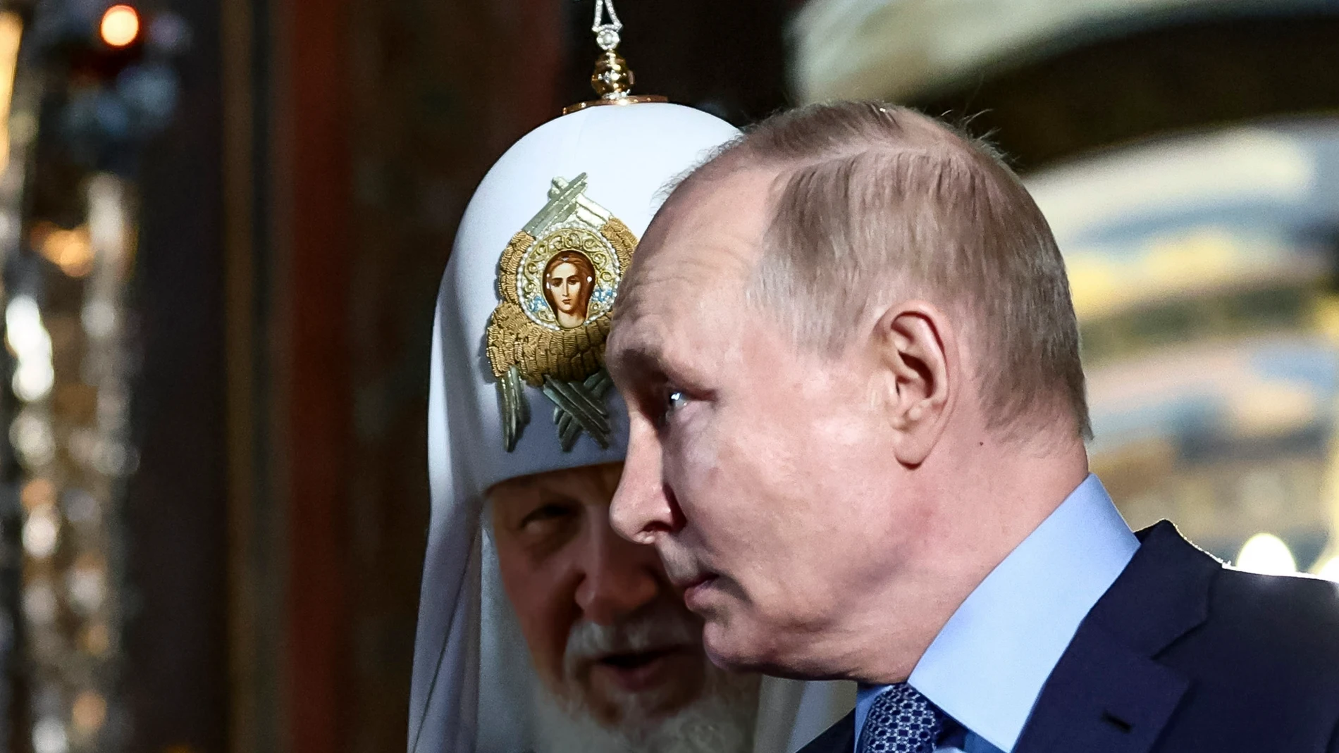 Russian President Vladimir Putin, right, accompanied by Russian Orthodox Patriarch Kirill, visits to the Trinity Cathedral at the Trinity Lavra of St. Sergius in Sergiev Posad, Moscow region, the town about 70 km (43,7 miles) north of Moscow, Russia, Wednesday, June 26, 2024. (Mikhail Tereshchenko, Sputnik, Kremlin Pool Photo via AP)