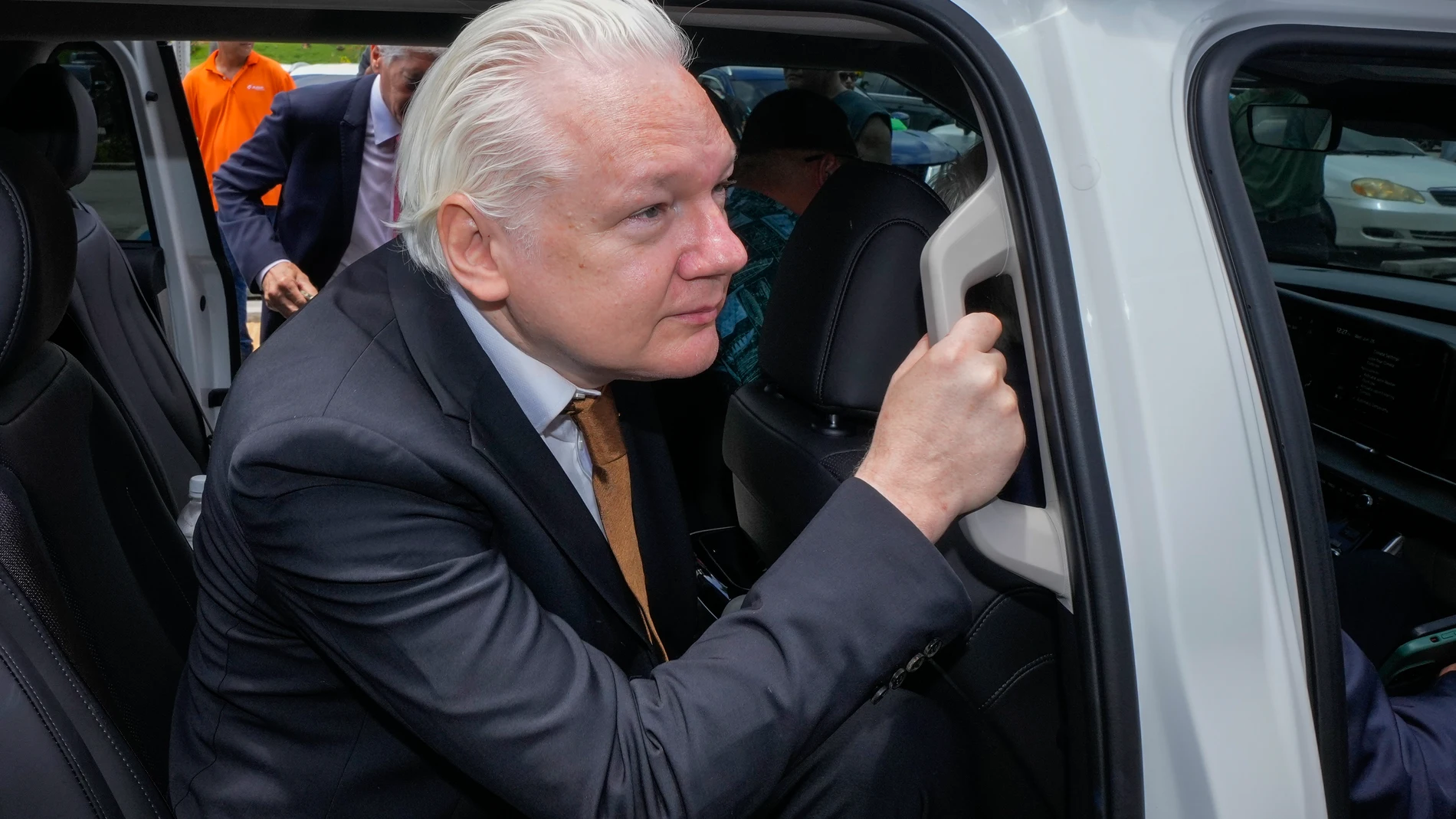 WikiLeaks founder Julian Assange leaves the federal court in Saipan, Mariana Islands, Wednesday, June 26 2024. (AP Photo/Eugene Hoshiko)