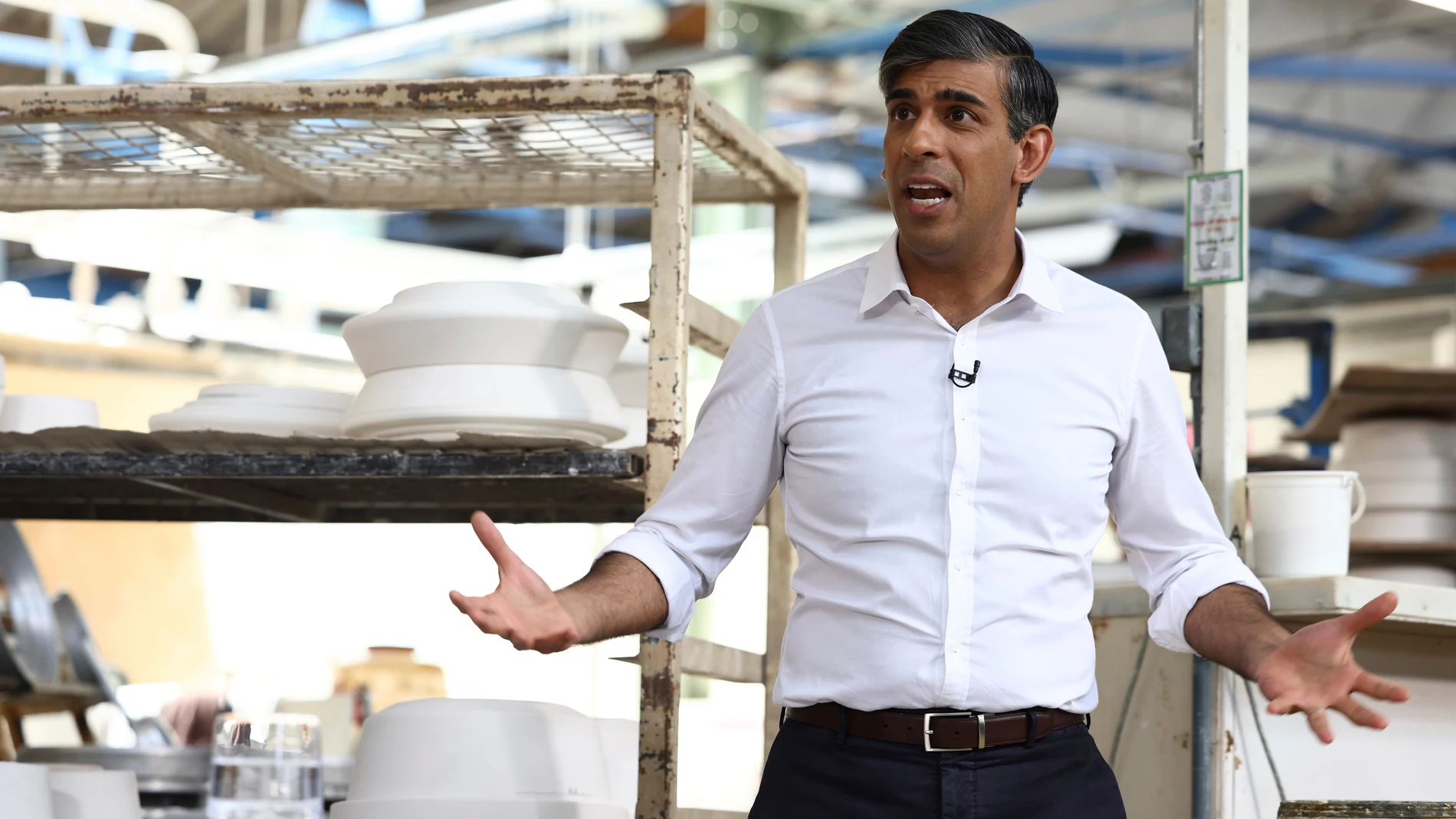 Britain's Prime Minister and Conservative Party leader, Rishi Sunak speaks during a visit to Denby Pottery Factory as part of a Conservative campaign event in the build-up to the UK general election on July 4, in Ripley, south England, Thursday June 27, 2024. (Darren Staples/Pool Photo via AP)