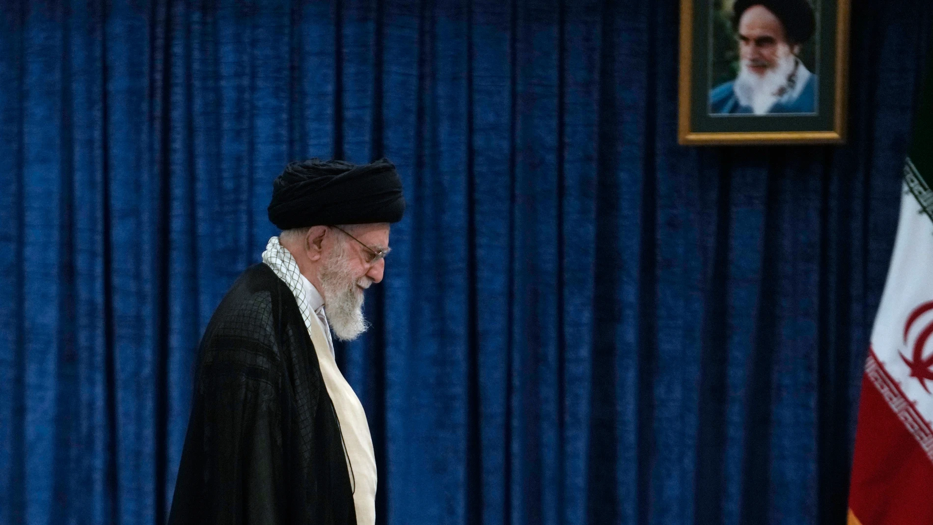 Iranian Supreme Leader Ayatollah Ali Khamenei leaves after casting his vote during the presidential election, in Tehran, Iran, Friday, June 28, 2024. Iranians were voting Friday in a snap election to replace the late President Ebrahim Raisi, killed in a helicopter crash last month, as public apathy has become pervasive in the Islamic Republic after years of economic woes, mass protests and tensions in the Middle East. (AP Photo/Vahid Salemi)
