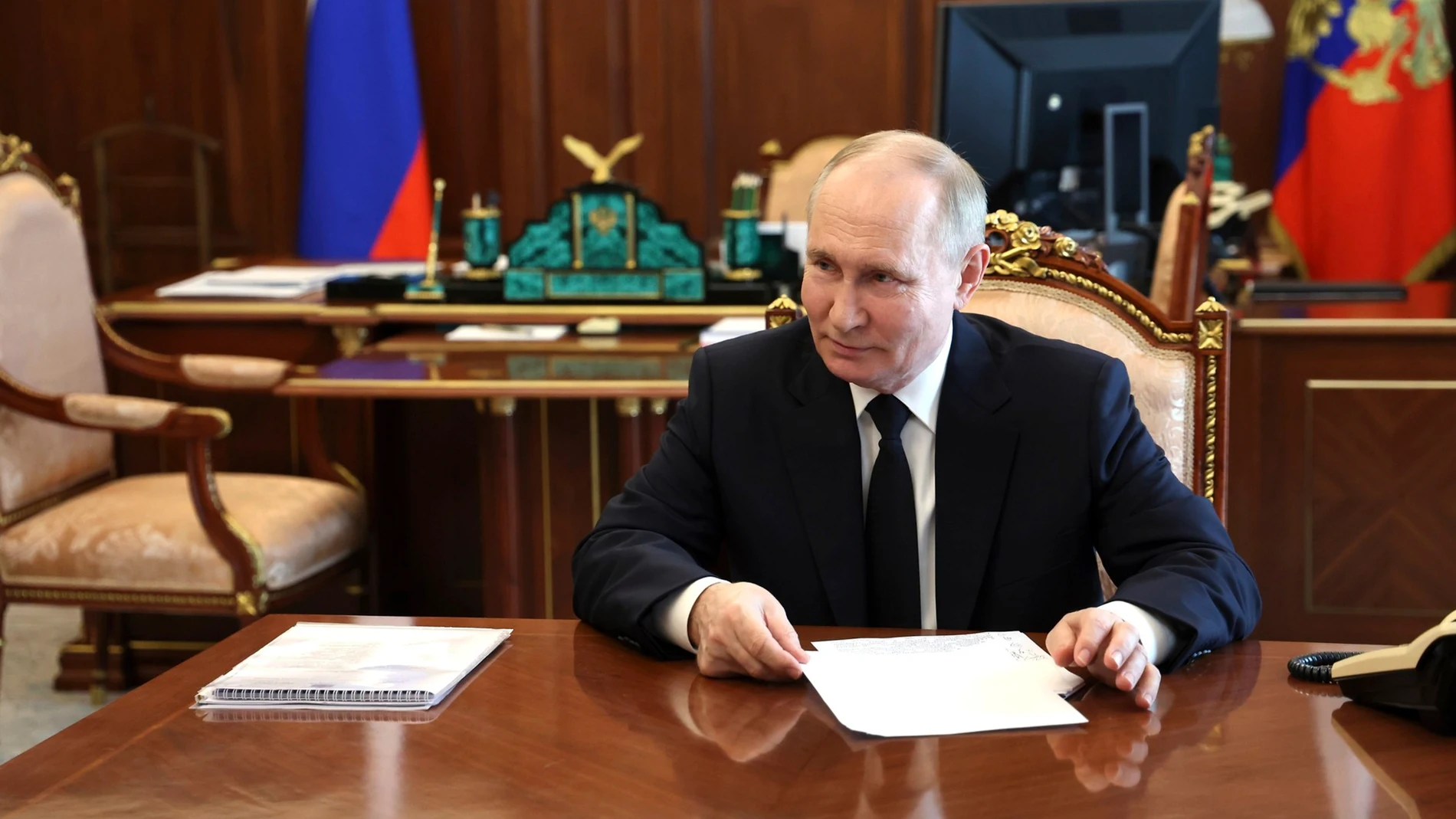 June 25, 2024, Moscow, Moscow Oblast, Russia: Russian President Vladimir Putin listens to Kherson Region Governor Vladimir Saldo during a face-to-face meeting at the Kremlin, June 25, 2024, in Moscow, Russia. 25/06/2024