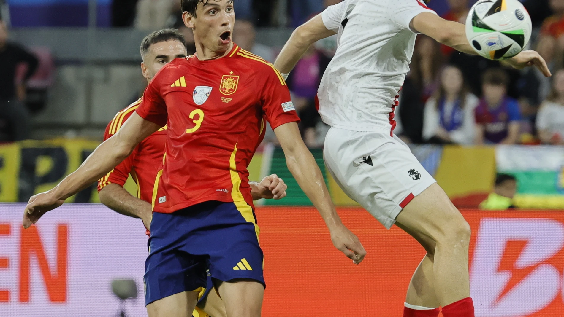 Cologne (Germany), 30/06/2024.- Robin Le Normand (L) of Spain reacts after scoring an own goal during the UEFA EURO 2024 Round of 16 soccer match between Spain and Georgia, in Cologne, Germany, 30 June 2024. (Alemania, España, Colonia) EFE/EPA/RONALD WITTEK
