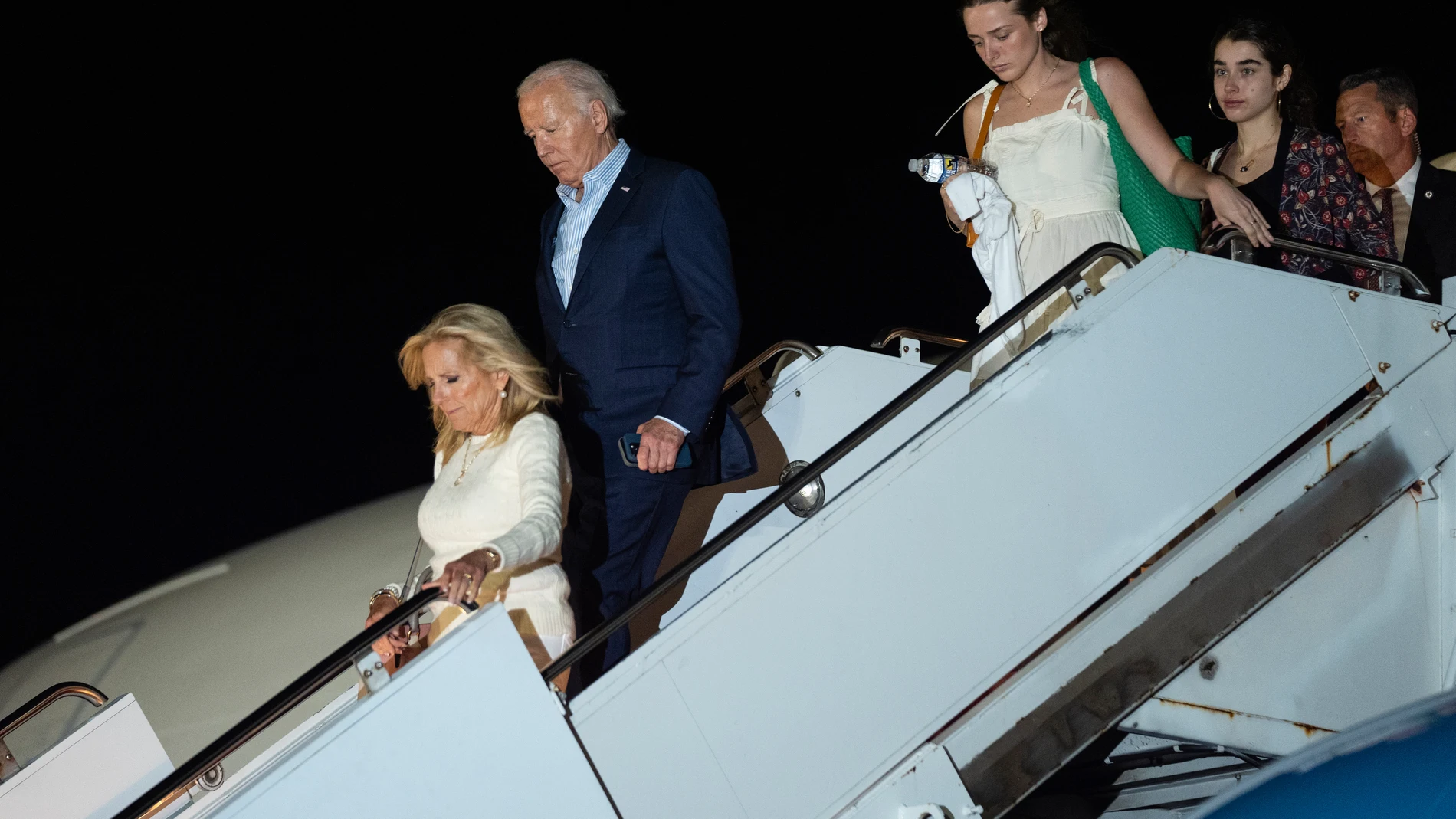 President Joe Biden arrives at Hagerstown Regional Airport, Saturday, June 29, 2024, in Hagerstown, Md. From left, first lady Jill Biden, Biden, Finnegan Biden, and Natalie Biden. (AP Photo/Evan Vucci)