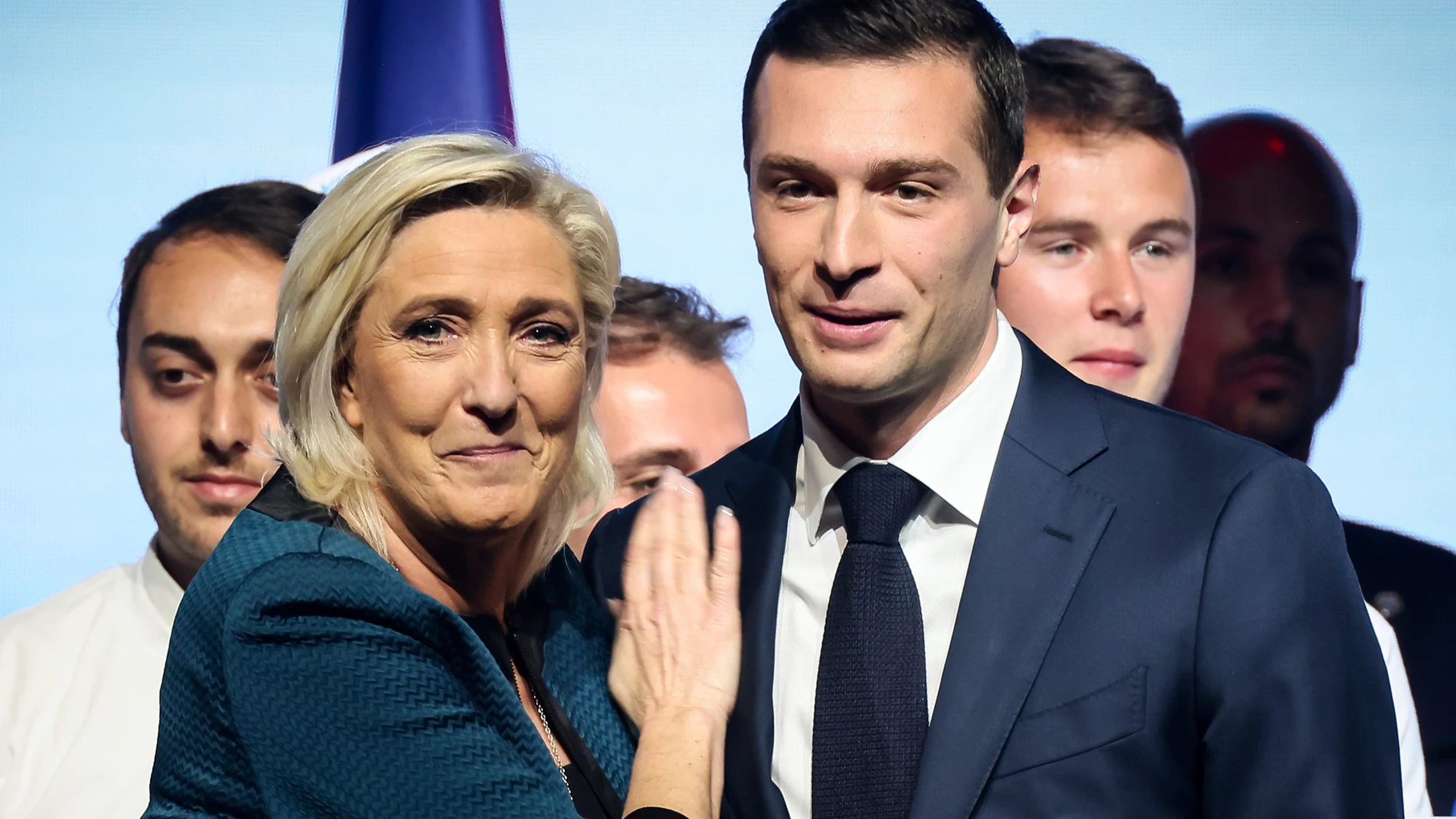 FILE - Leader of the French far-right National Rally Marine Le Pen, left, and lead candidate of the party for the upcoming European election Jordan Bardella during a political meeting on June 2, 2024 in Paris. At just 28 years old, Jordan Bardella has led the French far right to a landslide victory in the European Parliament election in June. After voters propelled Marine Le Pen's National Rally to a strong lead in the first round of national legislative elections on Sunday, Bardella has turn...