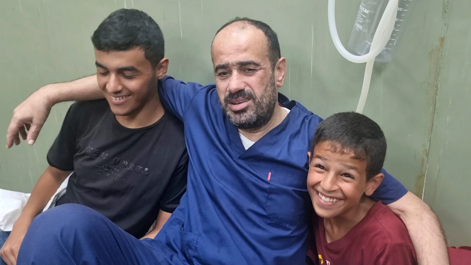 This video grab shows Mohammed Abu Selmia, the director of Gaza's main hospital, who was detained by Israeli forces in November, sitting with his family after his release, along with other detainees, at a hospital in Khan Younis, Gaza Strip on Monday, July 1, 2024. Israel released the director of Gaza's main hospital on Monday after holding him for seven months without charge or trial over allegations the facility had been used as a Hamas command center. He said he and other detainees were he...