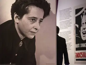 A photograph of German-American philosopher and political theorist Hannah Arendt (L) and a poster featuring a likeness of May 68 student leader Daniel Cohn- Bendit are on display during a press preview of the exhibition "Hannah Arendt and the Twentieth Century" at the German Historical Museum (Deutsches Historisches Museum - DHM) in Berlin A photograph of German-American philosopher and political theorist Hannah Arendt (L) and a poster featuring a likeness of May 68 student leader Daniel Cohn- Bendit are on display during a press preview of the exhibition "Hannah Arendt and the Twentieth Century" at the German Historical Museum (Deutsches Historisches Museum - DHM) in Berlin