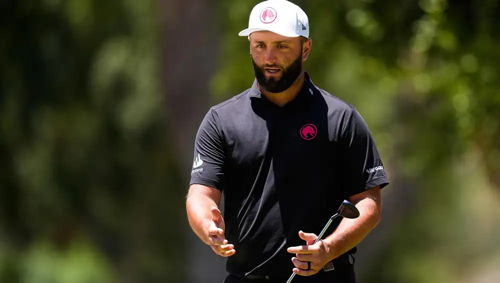 Golf/British.- (Crónica) Jon Rahm asoma en el Royal Troon pero Lowry no afloja