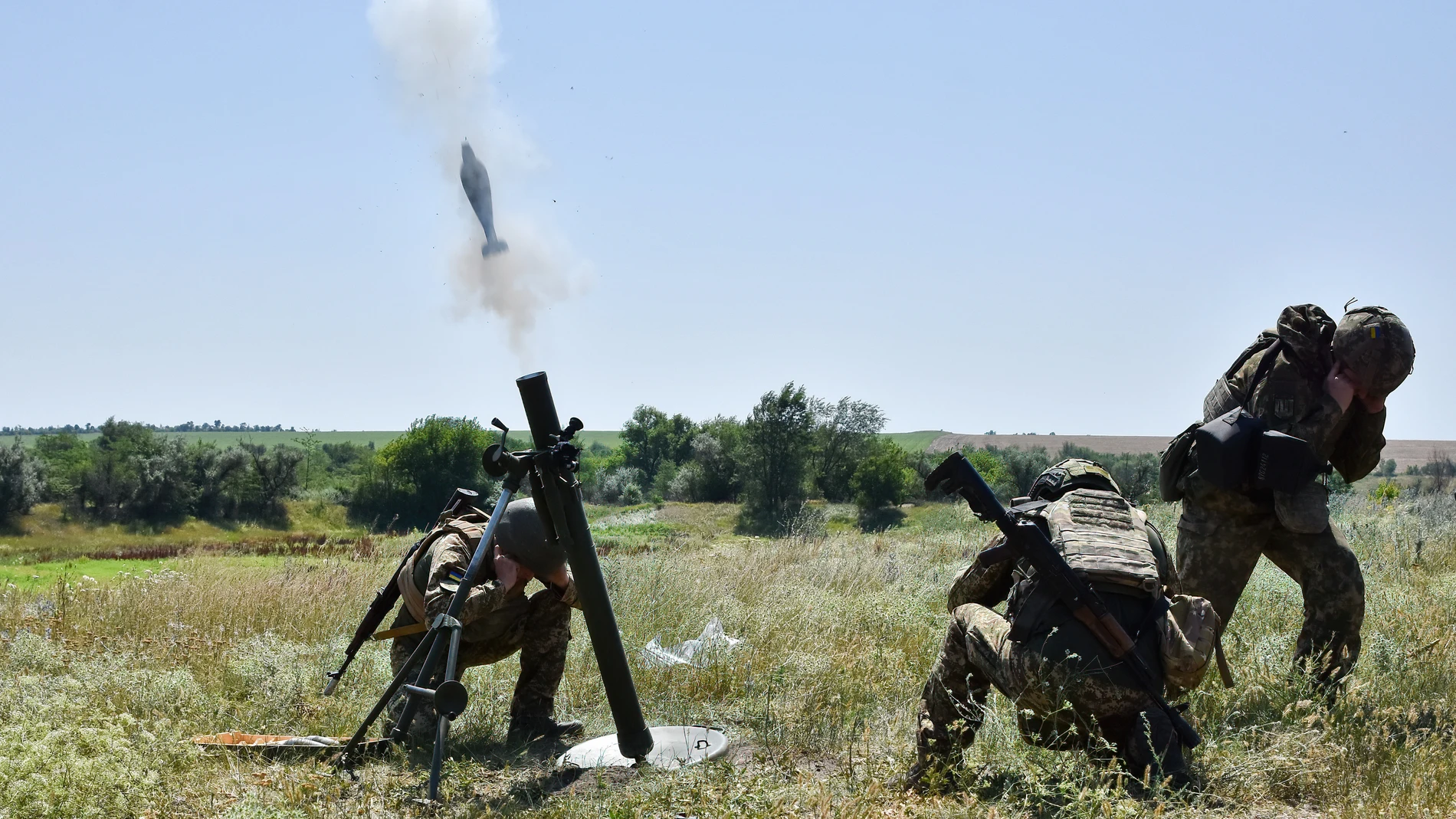 July 8, 2024, Zaporizhzhia, Ukraine: Ukrainian servicemen of the 15th Brigade (Kara-Dag) of the National Guard of Ukraine fire an 82mm mortar during the military practices. Ukraine and Russia are facing a ''deadly summer'' during which both sides will suffer heavy losses and may not be able to achieve a decisive turning point. For Ukraine, the task now will be to hold its frontline positions with fresh Western weapons. In turn, Russia will continue to use its usual tactics: meat assaults for ...