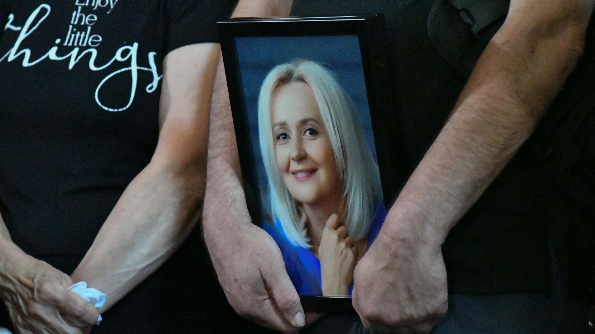 Lviv (Ukraine), 22/07/2024.- A person carries a photo of Ukrainian former MP Iryna Farion during her funeral procession in Lviv, Ukraine, 22 July 2024. Linguist and nationalist politician Iryna Farion died in hospital on the evening of 19 July after an unknown person shot her earlier that day near her house in Lviv, the National Police said. According to Ukrainian President Volodymyr Zelensky, the National Police of Ukraine and the Security Service of Ukraine have been deployed to search for ...