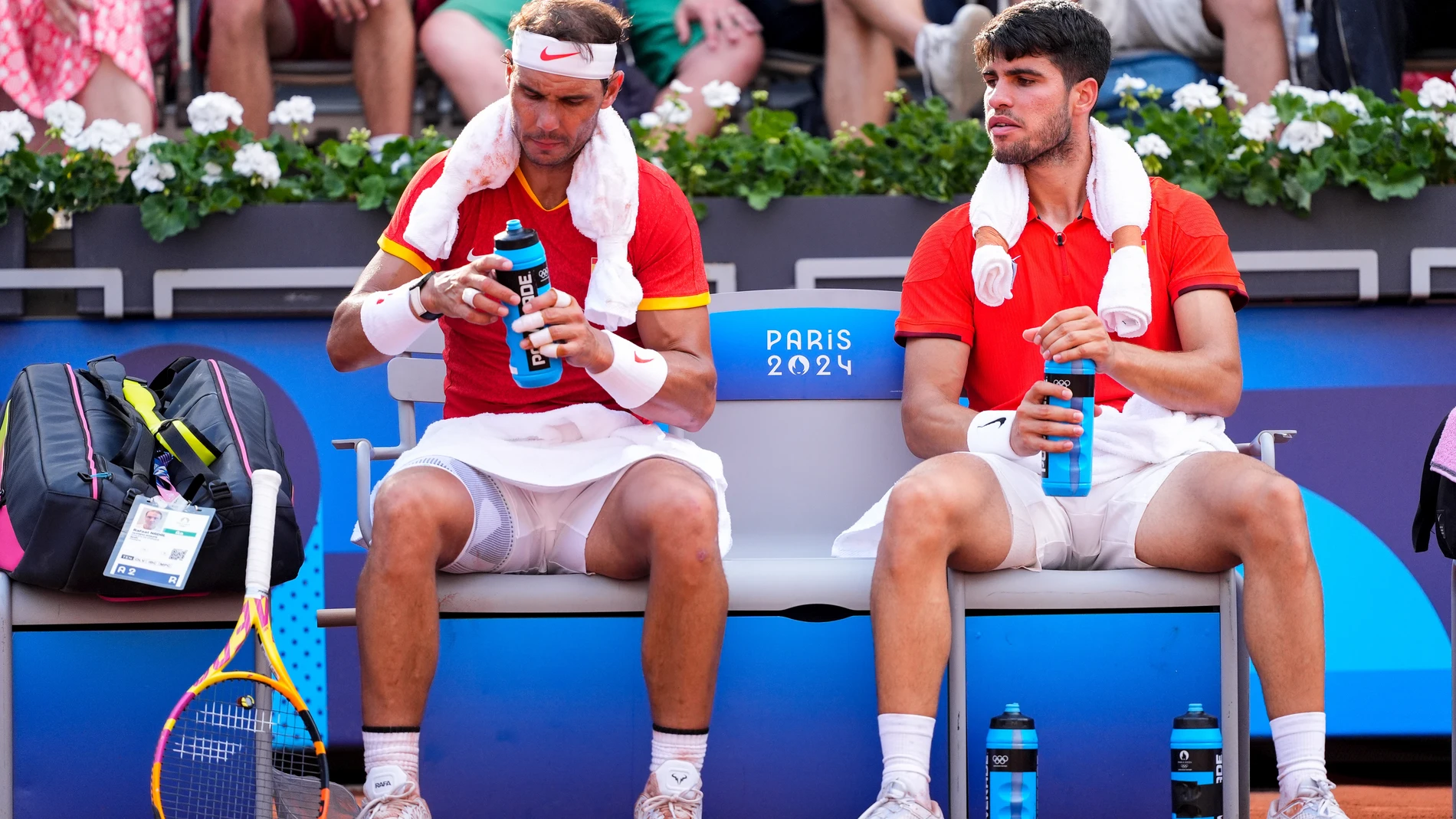 Rafael Nadal of Spain and Carlos Alcaraz of Spain look on against Tallon Griekspoor of Netherlands and Wesley Koolhof of Netherlands during their Men's Doubles Second Round Tennis match on Roland-Garros - Court Suzanne-Lenglen during the Paris 2024 Olympics Games on July 30, 2024 in Paris, France. AFP7 30/07/2024 ONLY FOR USE IN SPAIN