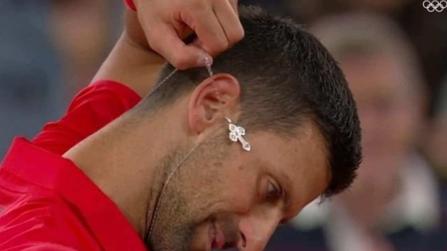 Djokovic y su icónica cruz