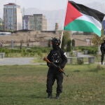 People gather to pray in Kabul for late Hamas political leader Ismail Haniyeh