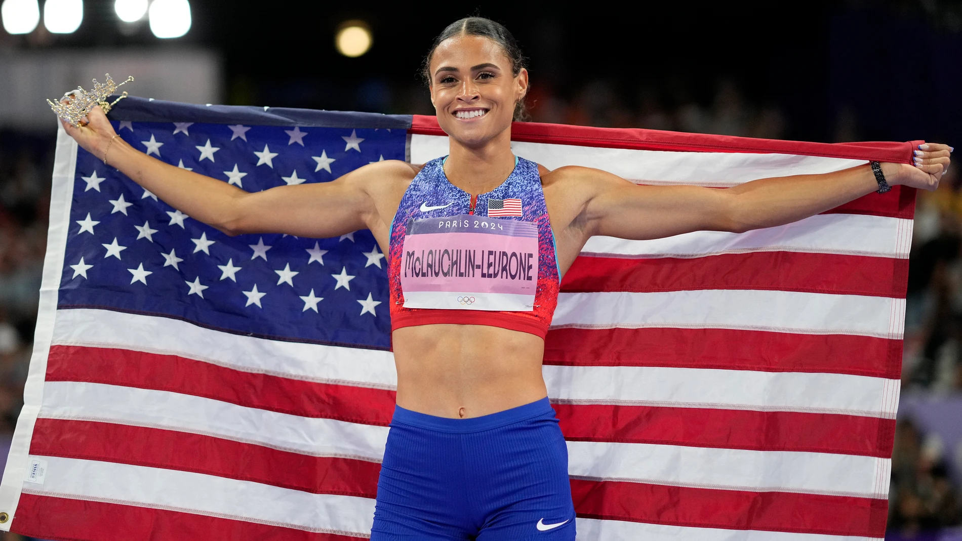 Sydney McLaughlin-Levrone, of the United States, celebrates after winning the women's 400-meter hurdles final at the 2024 Summer Olympics, Thursday, Aug. 8, 2024, in Saint-Denis, France. (AP Photo/Bernat Armangue)